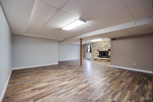 5172 Sheits Rd, Colerain Twp, OH 45251 - finished below grade area with baseboards, wood finished floors, a drop ceiling, and a fireplace