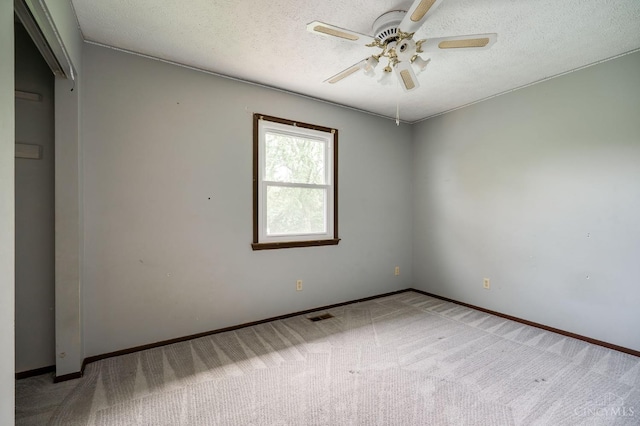 5172 Sheits Rd, Colerain Twp, OH 45251 - carpeted empty room with a ceiling fan, baseboards, and a textured ceiling