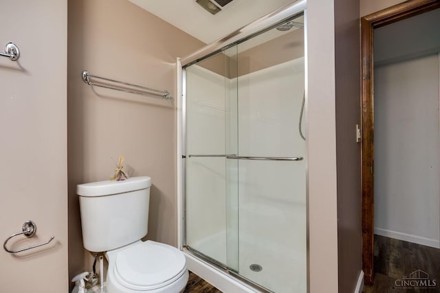 5172 Sheits Rd, Colerain Twp, OH 45251 - full bathroom featuring toilet, wood finished floors, and a stall shower