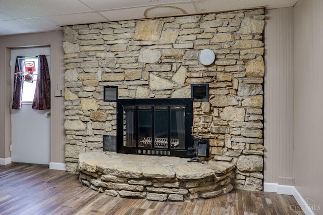 5172 Sheits Rd, Colerain Twp, OH 45251 - detailed view of baseboards, wood finished floors, and a fireplace