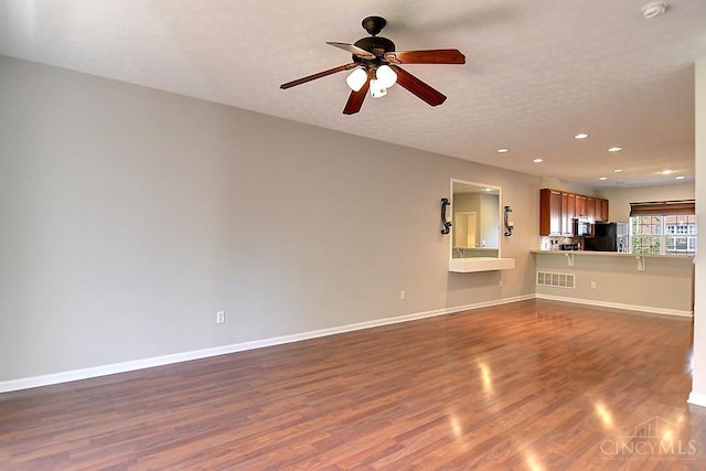 4291 Straight Arrow Rd, Beavercreek, OH 45430 - unfurnished living room with recessed lighting, dark wood-style flooring, and a ceiling fan