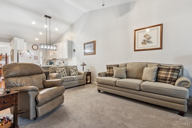 living room with recessed lighting, ceiling fan, light colored carpet, and lofted ceiling