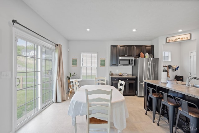 10522 Atterbury Dr, Crosby Twp, OH 45030 - dining room with healthy amount of natural light and recessed lighting
