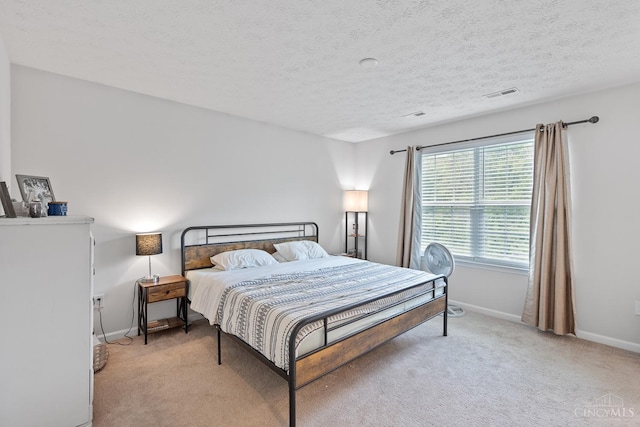 10522 Atterbury Dr, Crosby Twp, OH 45030 - bedroom with light colored carpet, baseboards, and a textured ceiling
