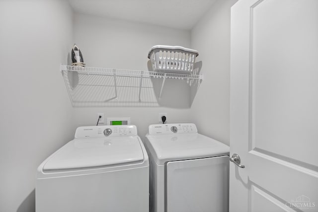 10522 Atterbury Dr, Crosby Twp, OH 45030 - laundry room featuring washing machine and clothes dryer