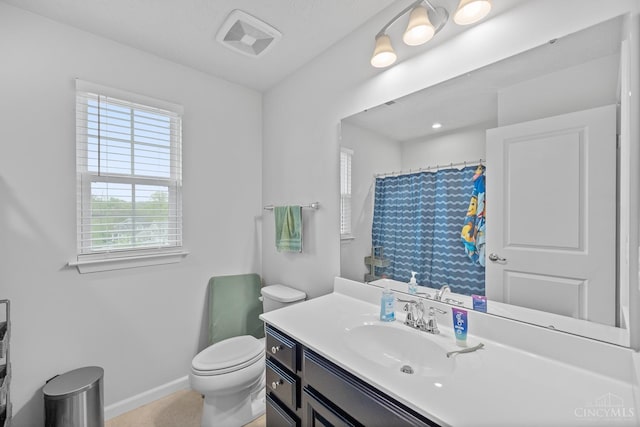 10522 Atterbury Dr, Crosby Twp, OH 45030 - bathroom featuring vanity, toilet, baseboards, and a shower with shower curtain