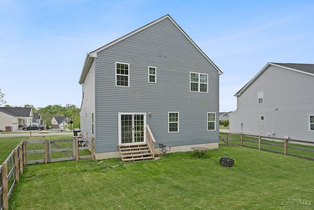 10522 Atterbury Dr, Crosby Twp, OH 45030 - back of house with entry steps and a fire pit