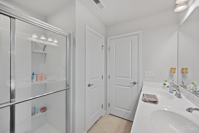 10522 Atterbury Dr, Crosby Twp, OH 45030 - bathroom with a stall shower and double vanity