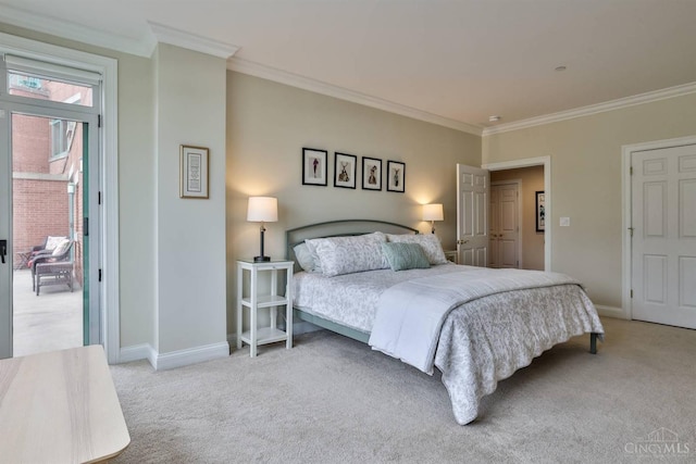 carpeted bedroom featuring crown molding, access to exterior, and baseboards