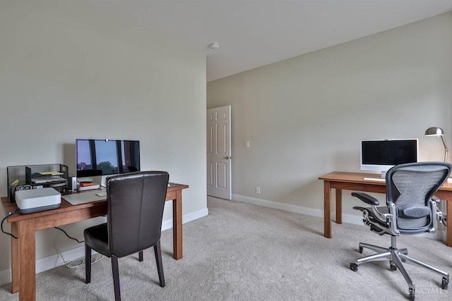 office with carpet flooring and baseboards