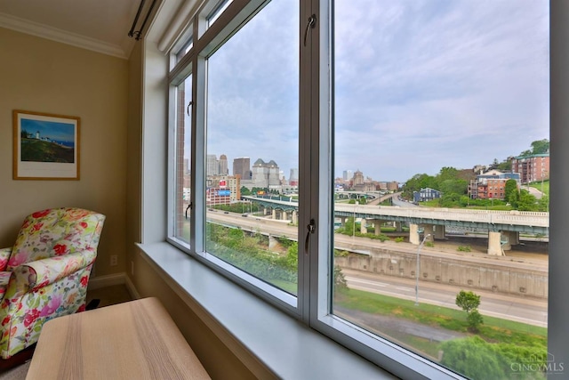 sunroom featuring a view of city