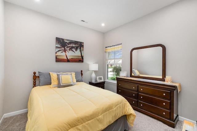 carpeted bedroom featuring visible vents, baseboards, and recessed lighting