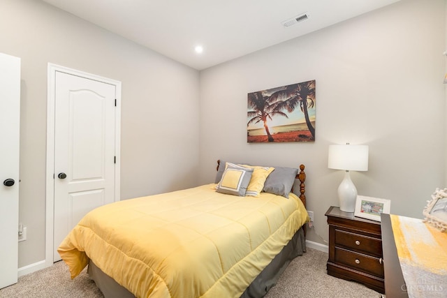 bedroom with light carpet, baseboards, visible vents, and recessed lighting