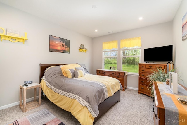 bedroom with light carpet, baseboards, and recessed lighting