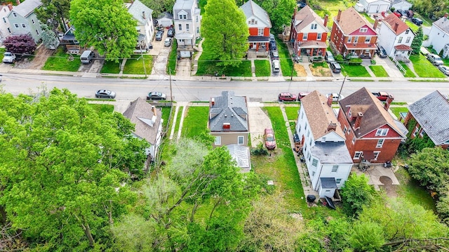 birds eye view of property with a residential view