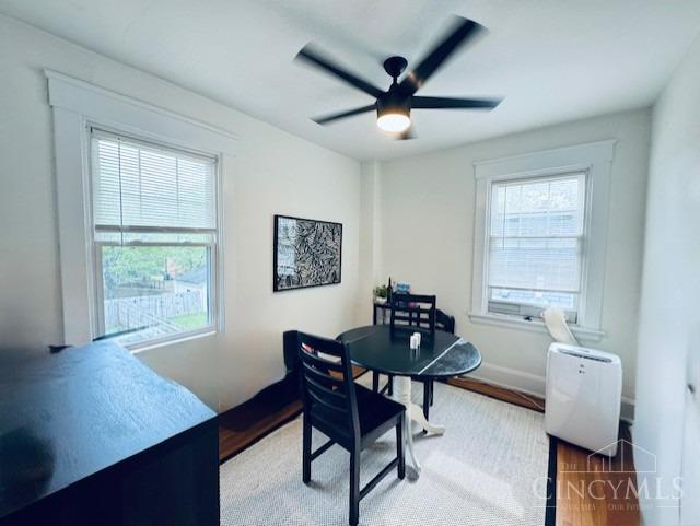 2848 Markbreit Ave, Cincinnati, OH 45209 - home office with a ceiling fan, baseboards, and wood finished floors