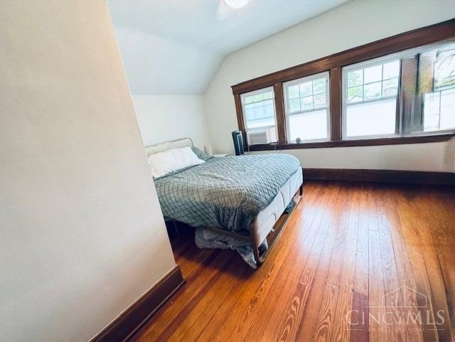 2848 Markbreit Ave, Cincinnati, OH 45209 - bedroom with baseboards, vaulted ceiling, and hardwood / wood-style floors