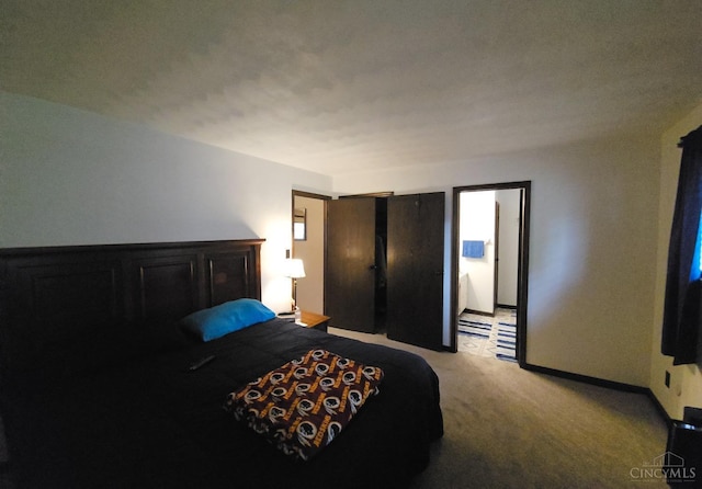 bedroom featuring light carpet
