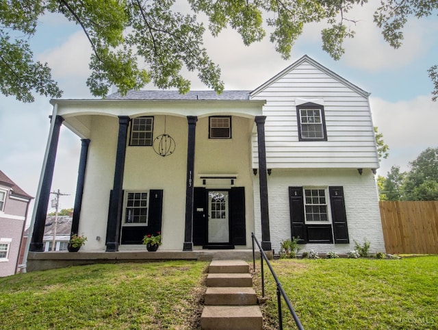 1103 Towanda Ter, Cincinnati, OH 45216 - neoclassical home with fence, stucco siding, and a front yard
