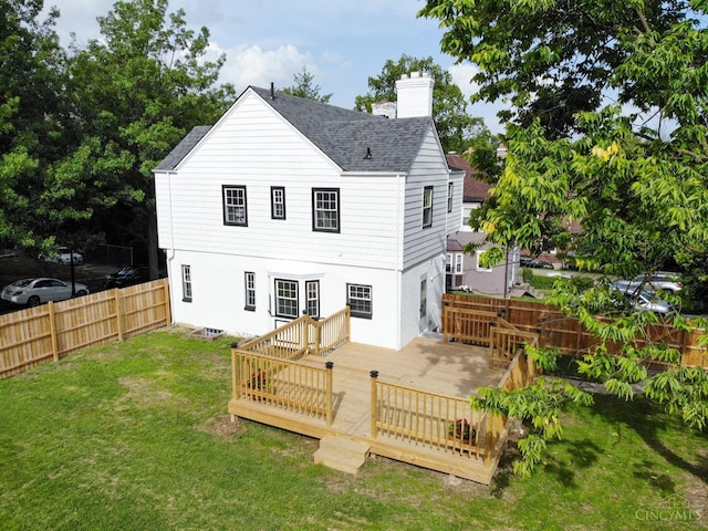1103 Towanda Ter, Cincinnati, OH 45216 - rear view of house featuring a chimney, a wooden deck, a fenced backyard, a yard, and roof with shingles