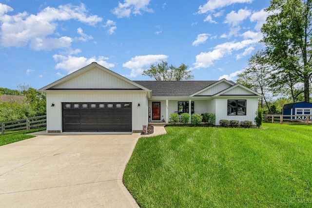view of front of property featuring an attached garage, concrete driveway, and a shingled roof