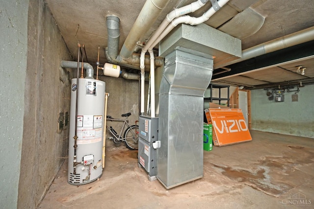 6014 Argus Rd, Cincinnati, OH 45224 - utility room featuring water heater and heating unit