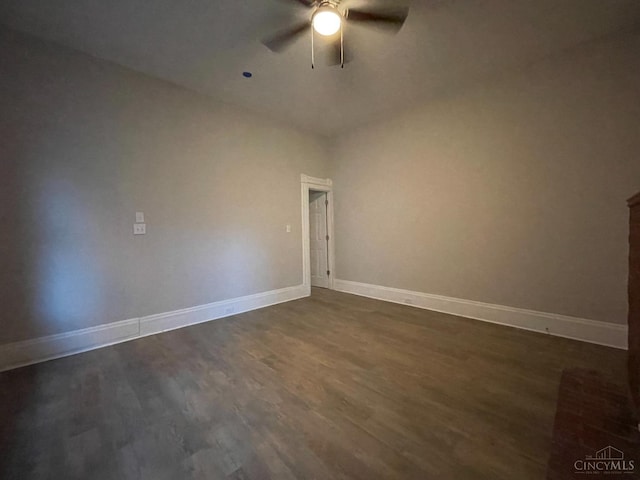 2259 Loth St, Cincinnati, OH 45219 - empty room featuring ceiling fan, dark wood-style floors, and baseboards