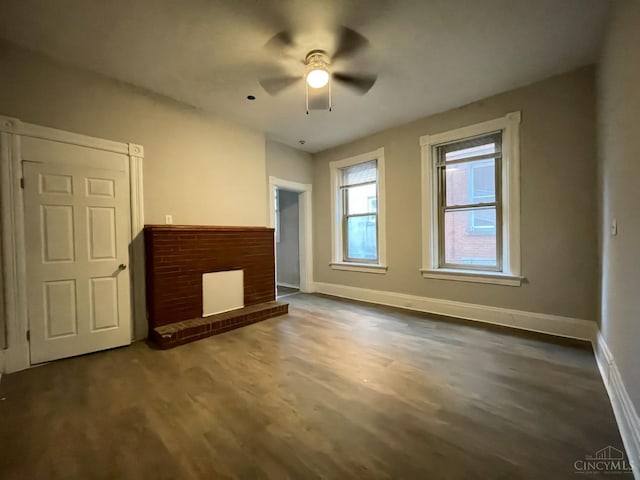 2259 Loth St, Cincinnati, OH 45219 - unfurnished living room with ceiling fan, baseboards, and dark wood-style floors