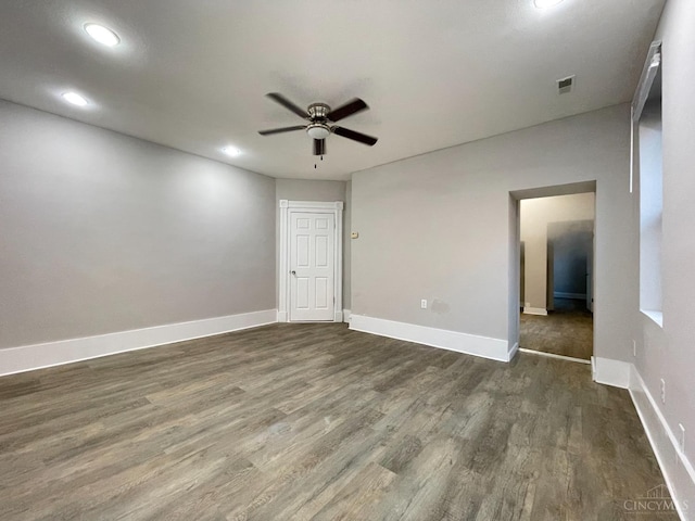 2259 Loth St, Cincinnati, OH 45219 - empty room featuring a ceiling fan, dark wood-style flooring, recessed lighting, and baseboards