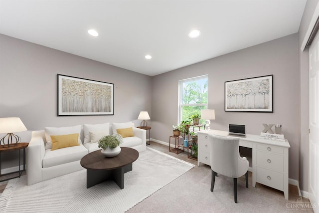 home office featuring baseboards, light carpet, and recessed lighting