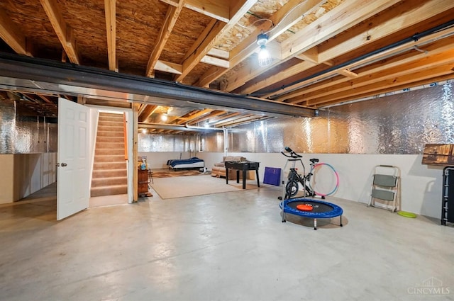 unfinished basement with stairs