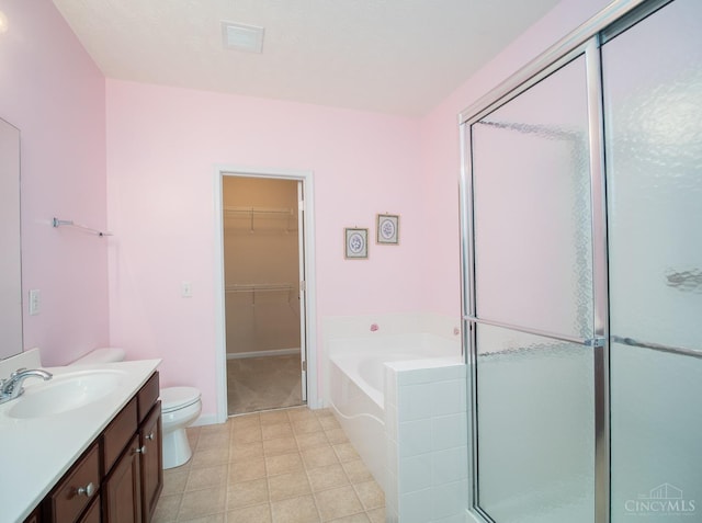 9413 Stoneybrooke, Springfield Twp, OH 45231 - full bath with vanity, a bath, a shower stall, tile patterned floors, and toilet