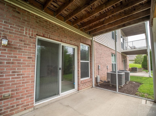 9413 Stoneybrooke, Springfield Twp, OH 45231 - view of patio with central AC and a balcony