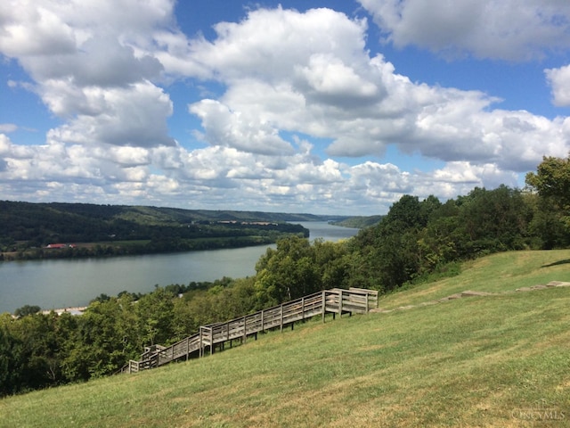 water view featuring a heavily wooded area