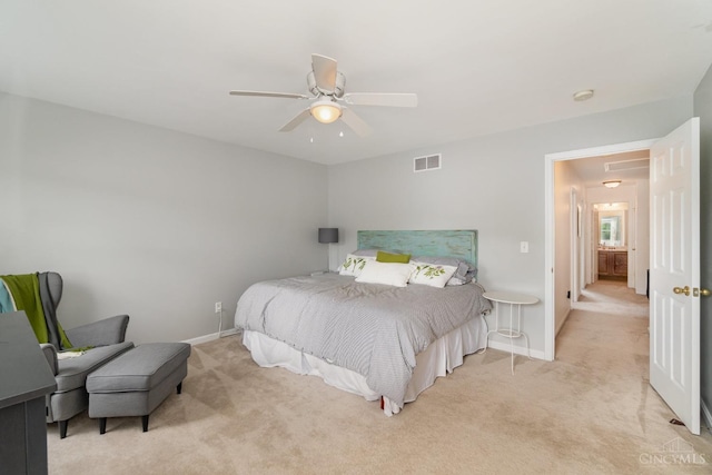 bedroom featuring light carpet, baseboards, and a ceiling fan
