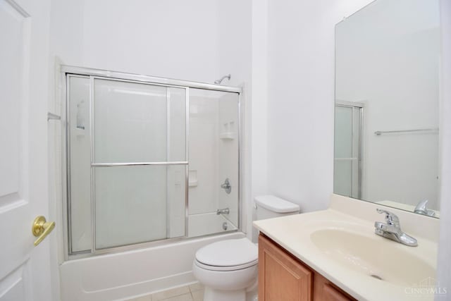 6720 Kelseys Oak Ct, Green Twp, OH 45248 - bathroom with vanity, toilet, bath / shower combo with glass door, and tile patterned flooring