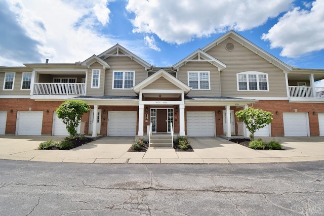 6720 Kelseys Oak Ct, Green Twp, OH 45248 - multi unit property with a garage, driveway, and brick siding