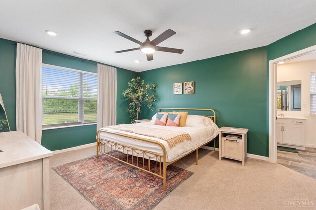 1750 Parkfield Way, Goshen Twp, OH 45122 - bedroom with light colored carpet, recessed lighting, baseboards, a ceiling fan, and ensuite bathroom