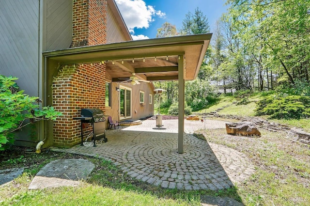 11675 New Biddinger Rd, Harrison Twp, OH 45030 - view of patio / terrace featuring area for grilling and ceiling fan