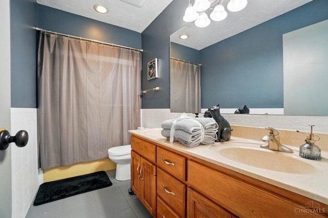 11675 New Biddinger Rd, Harrison Twp, OH 45030 - bathroom with vanity, toilet, tile patterned flooring, and a chandelier