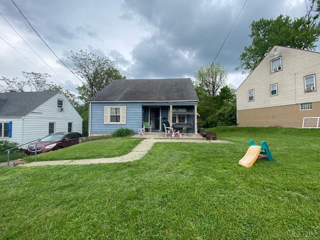 3518 Fyffe Ave, Cincinnati, OH 45211 - rear view of house featuring a yard and a patio area