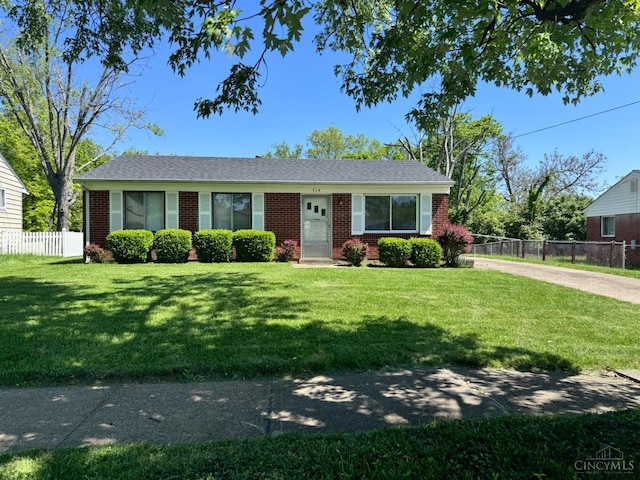 ranch-style home featuring brick siding