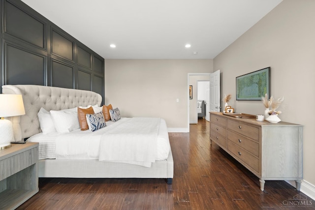 bedroom with dark wood-style flooring, baseboards, and recessed lighting