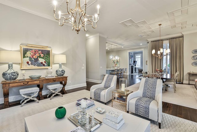 dining space featuring a chandelier, wood-type flooring, baseboards, crown molding, and recessed lighting