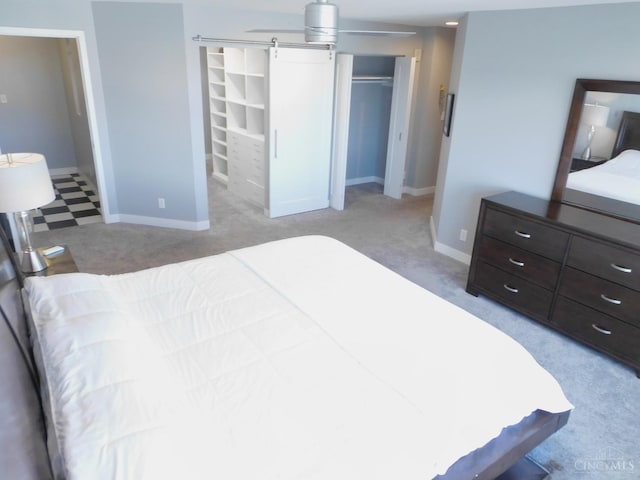 bedroom featuring carpet flooring and baseboards