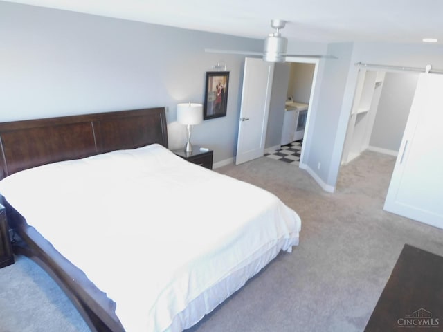 bedroom with carpet and baseboards