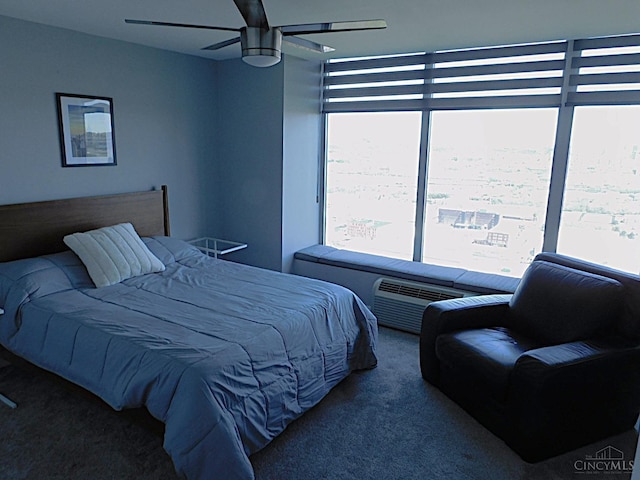 carpeted bedroom with a ceiling fan