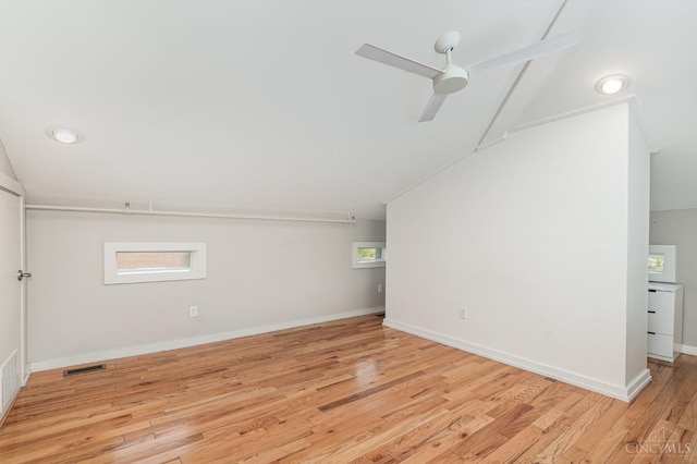 bonus room featuring wood finished floors, ceiling fan, and baseboards