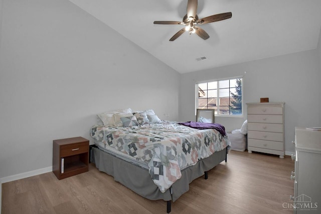 1740 Piper Ln Unit 206, Centerville, OH 45440 - bedroom featuring lofted ceiling, wood finished floors, baseboards, and ceiling fan