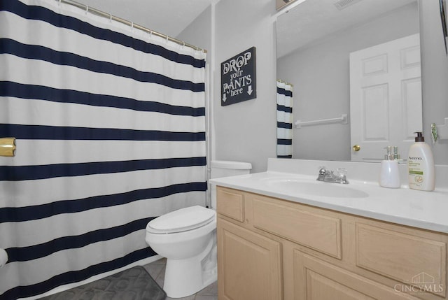 1740 Piper Ln Unit 206, Centerville, OH 45440 - bathroom with toilet, tile patterned flooring, vanity, and a shower with shower curtain